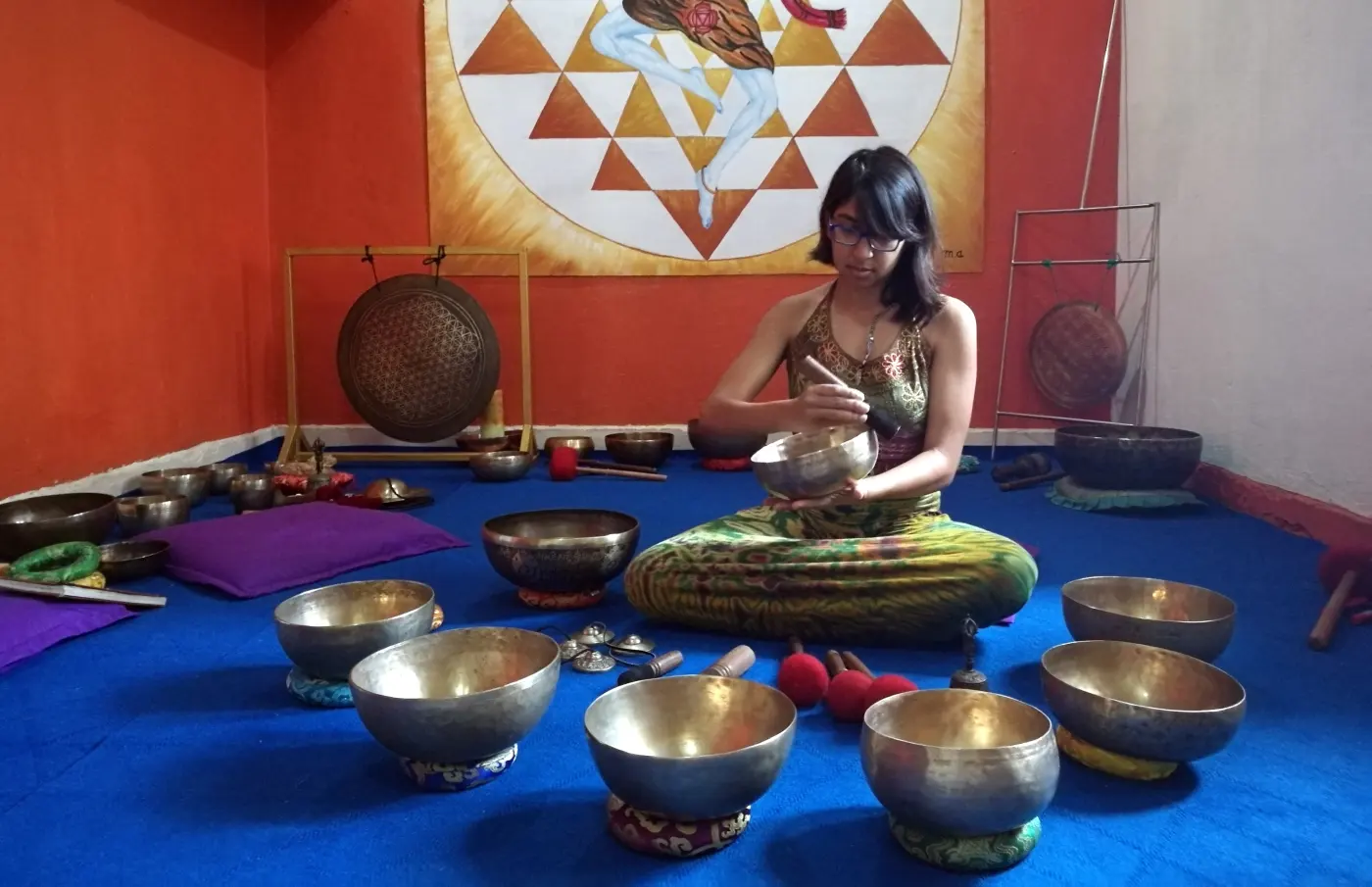 Narissa with Himalayan singing bowls during teacher training in Nepal